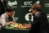 Viswanathan Anand (left)